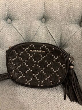 Michael Kors Black Leather Grommet Crossbody with Tassel Accent
